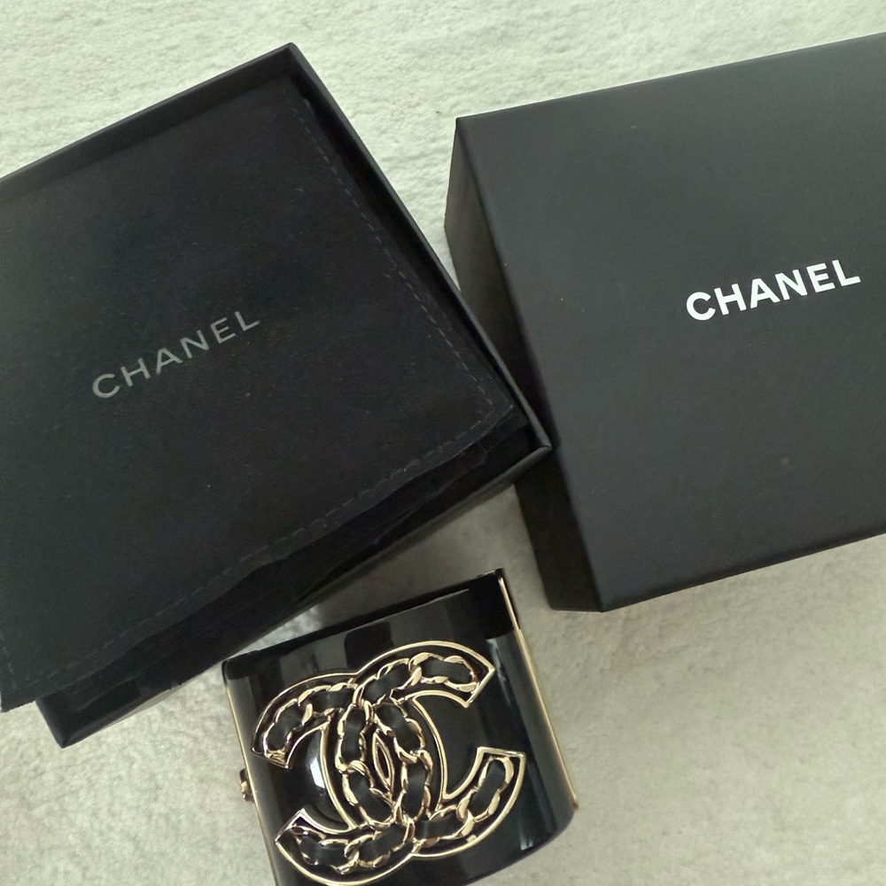 CHANEL Black Cuff with Gold Logo